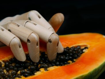 sliced fruit on orange plate